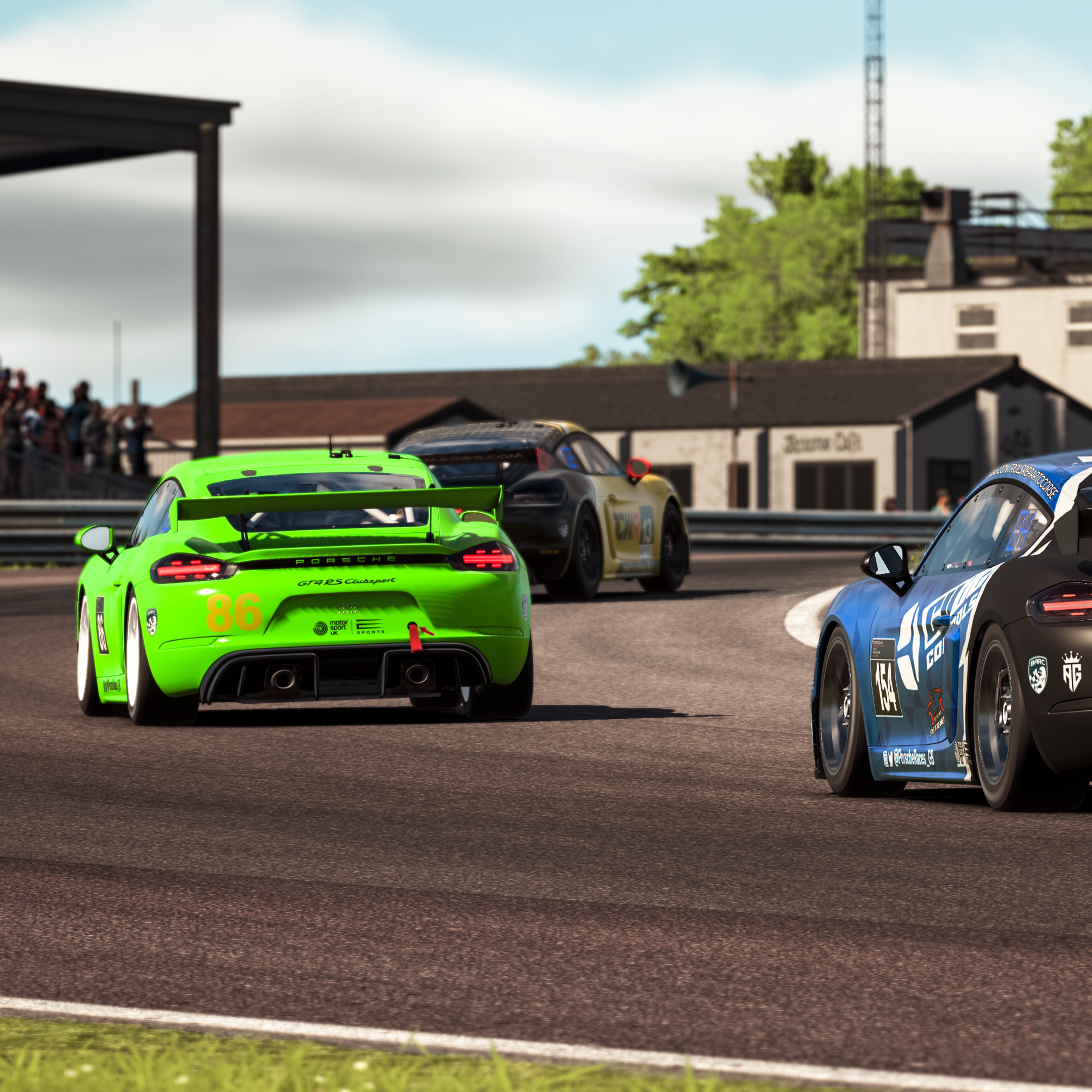 Rear view of a virtual 911 racing on Silverstone near the finish line