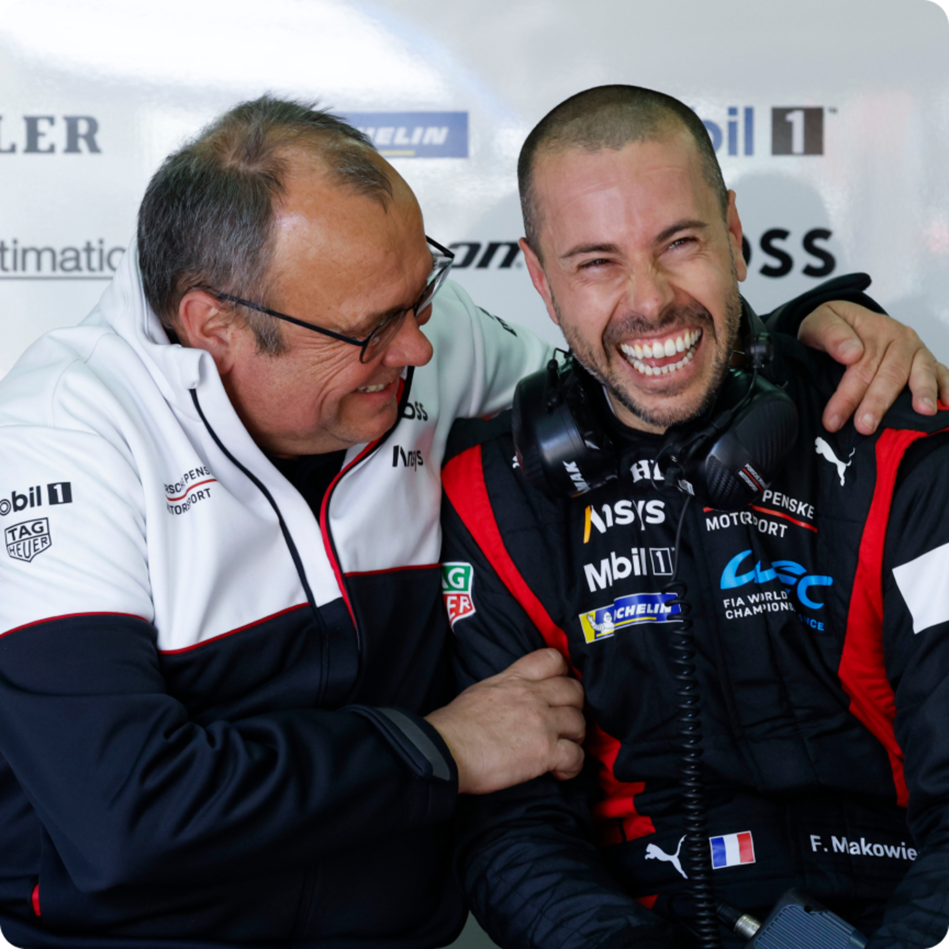 Colleagues laughing in the Penske Team