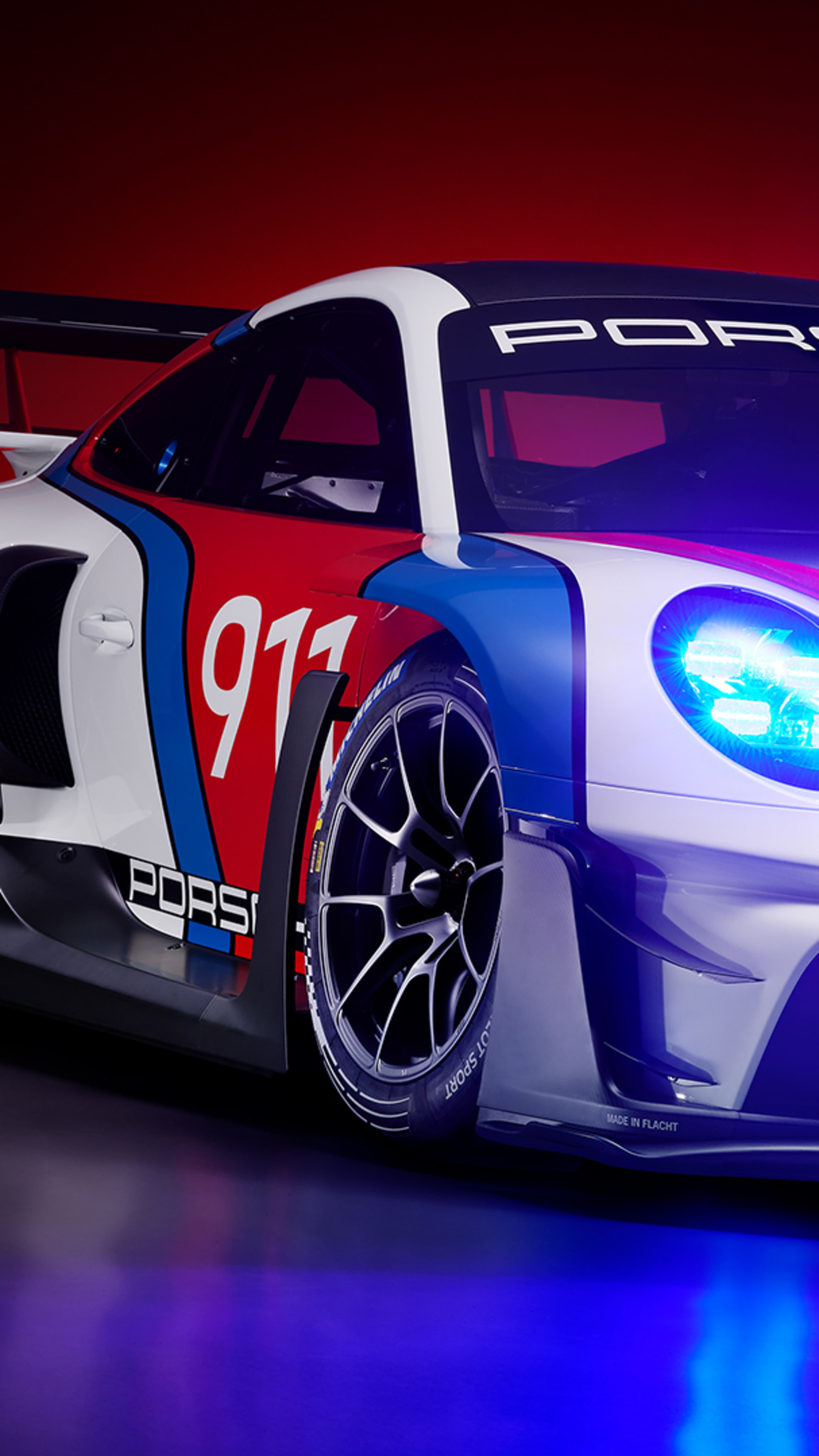 3/4 front motive of the GT3 R rennsport in studio environment, frog perspective.