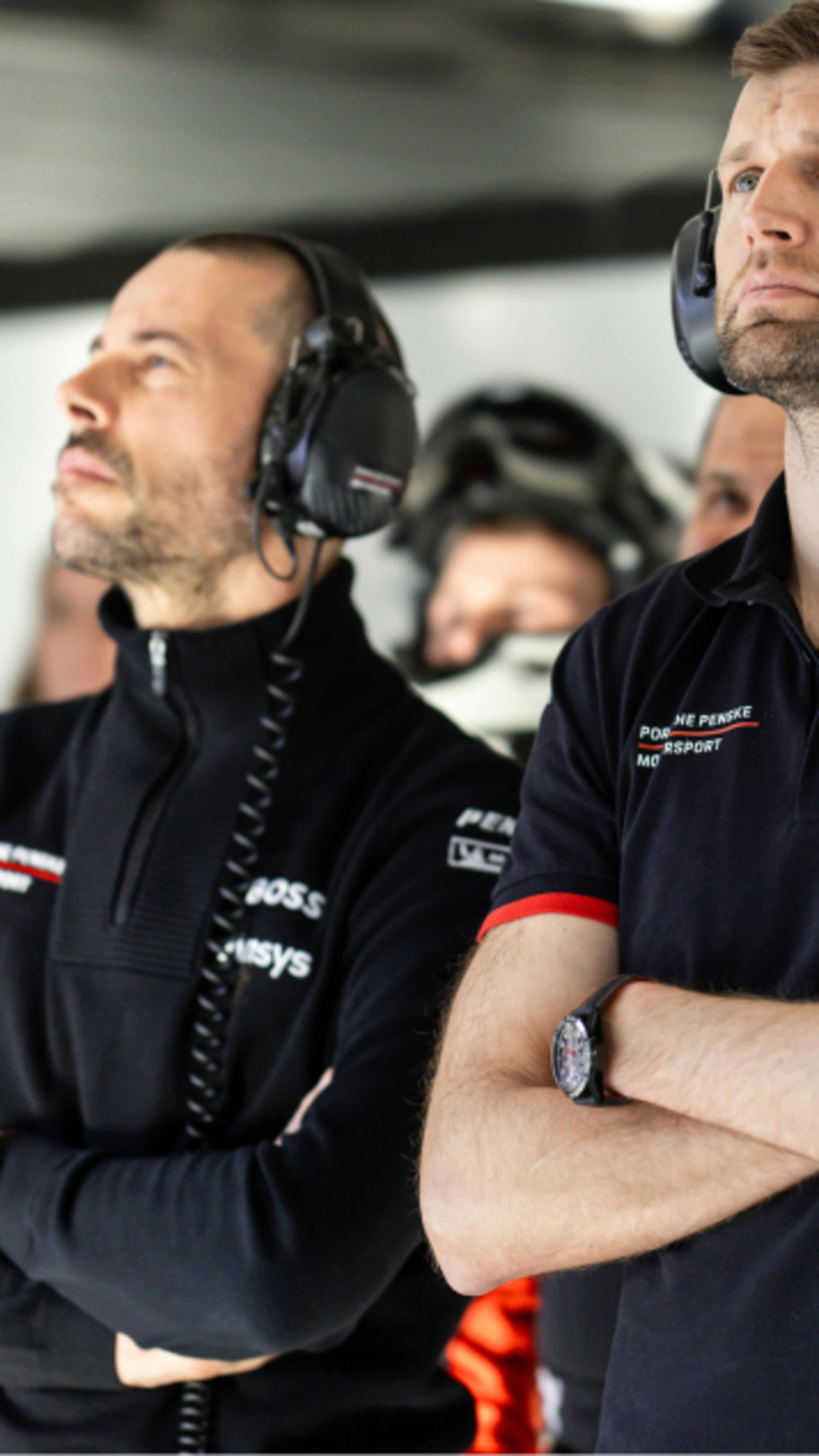 team looking up to a screen 