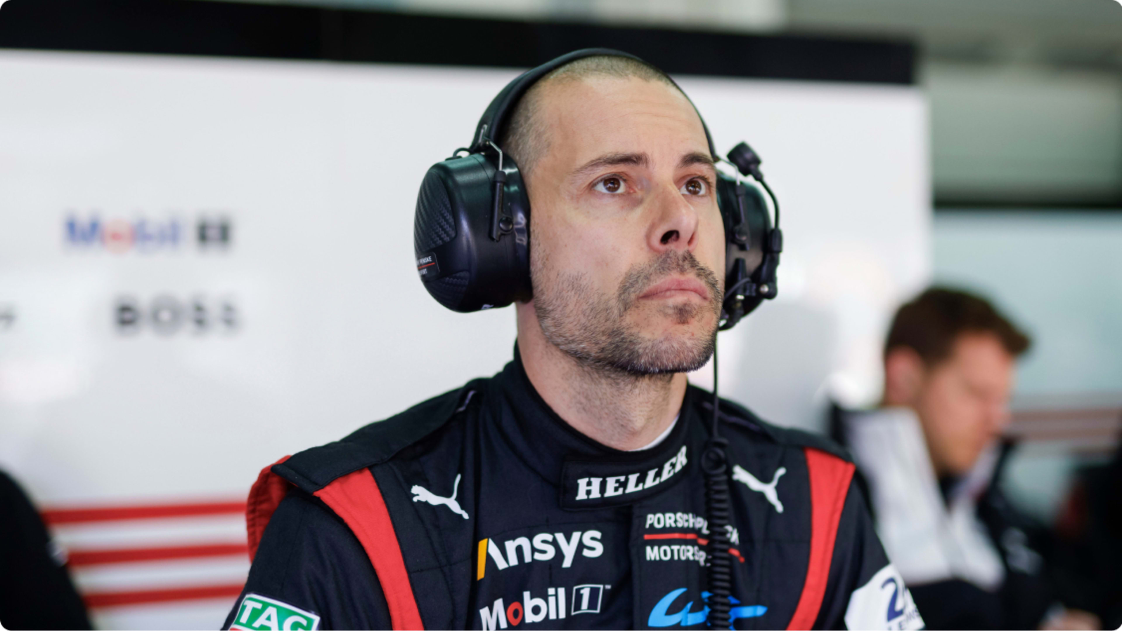 Makowiecki with headphones on looking focussed 
