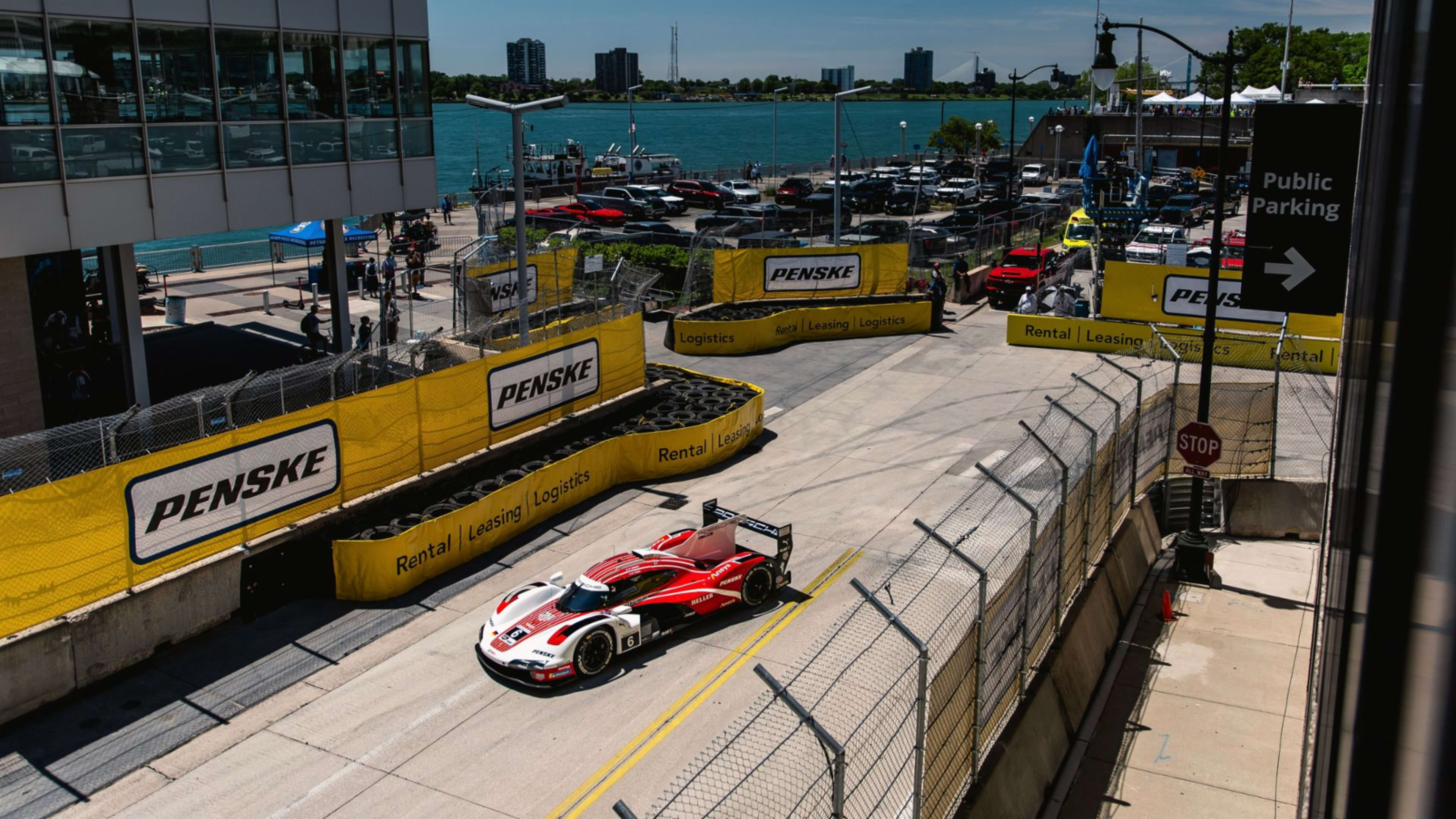 The #6 Porsche Penske Motorsport car takes on the Detroit Grand Prix street circuit