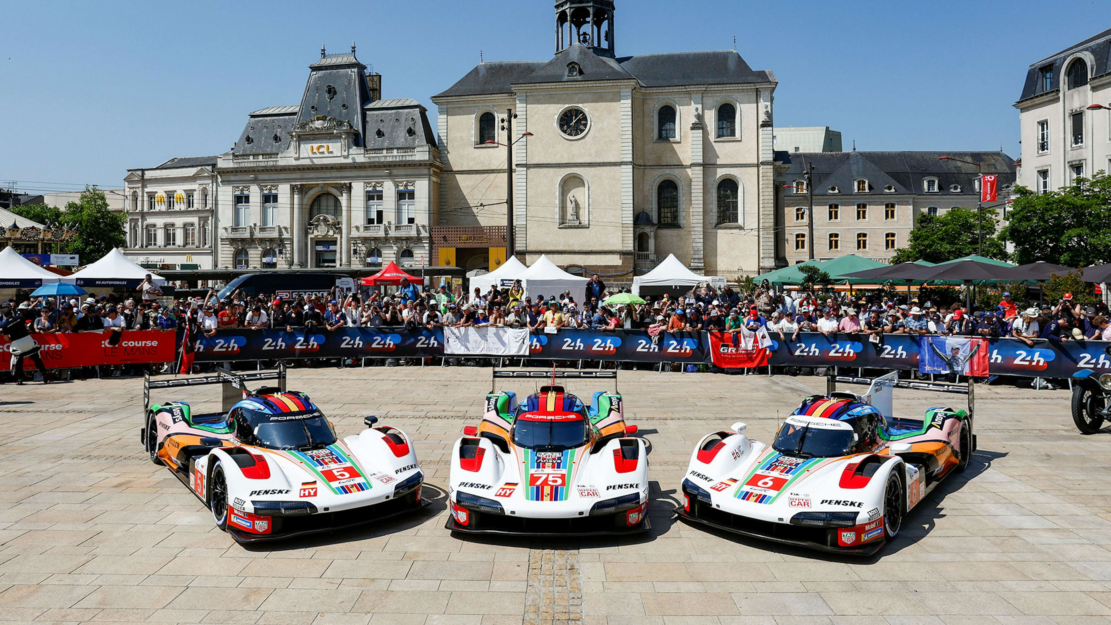 The three Porsche 963 during the presenation in Le Mans.