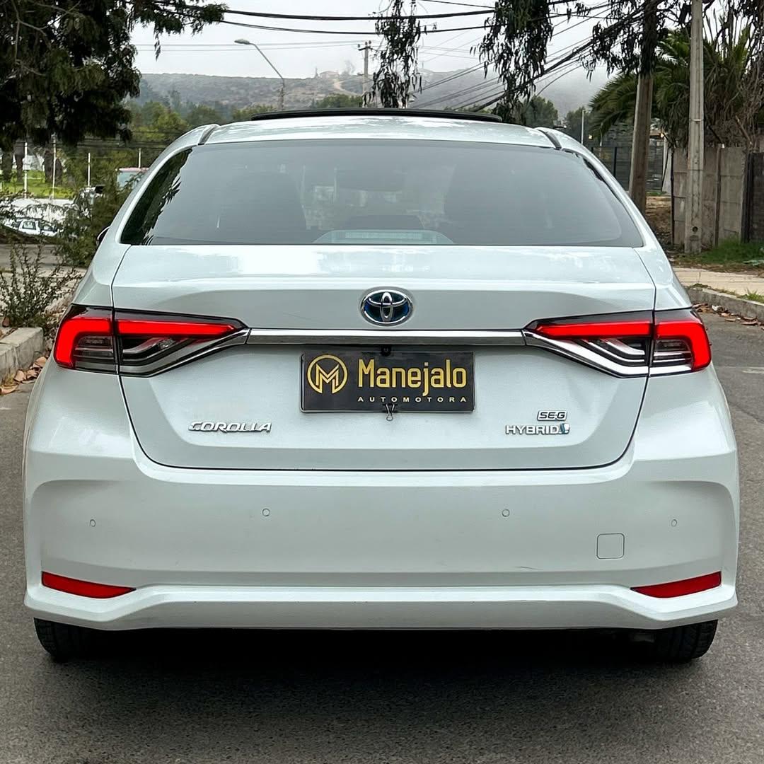 2022 Toyota COROLLA HYBRID SEG ECVT 2.0L 🇯🇵 Blanco - Miniatura 10