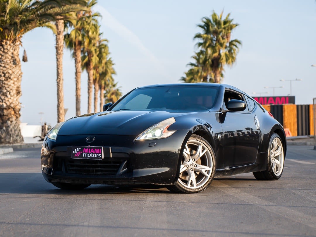 2011 Nissan 370Z Azul primavera metalizado negro - Imagen 1