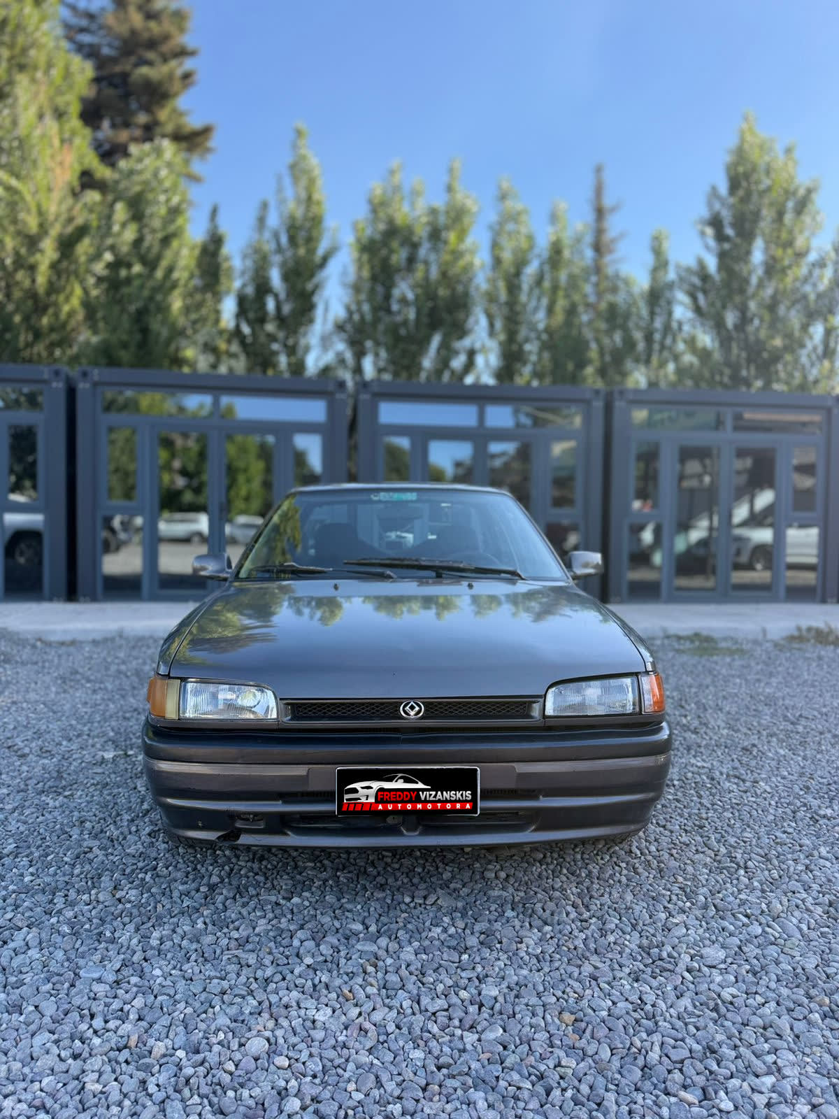 1995 Mazda 323 GLX - Miniatura 2