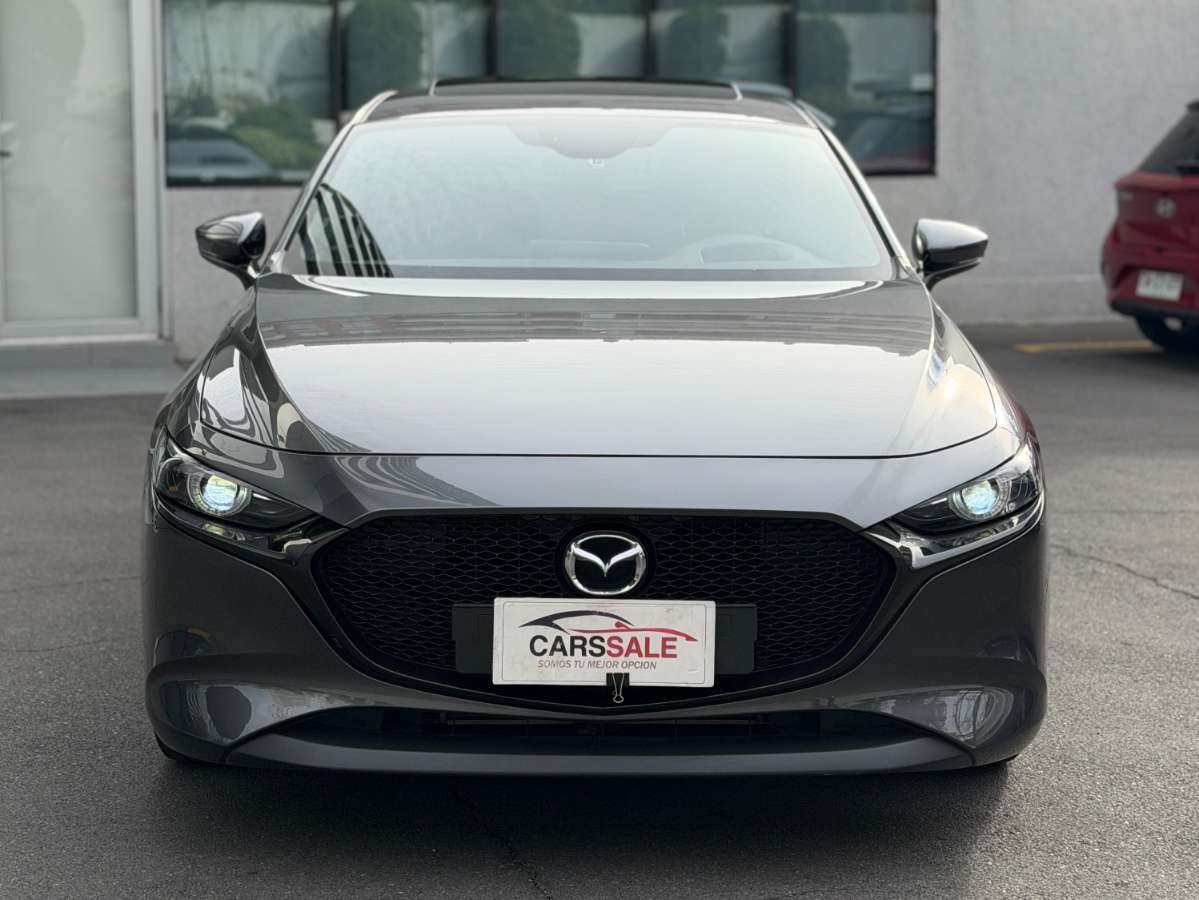 2026 Mazda 3 · Gris - Imagen 1