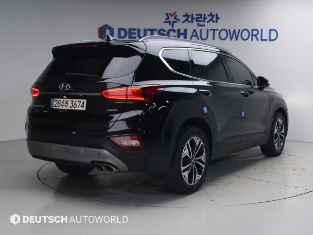 2019 Hyundai Santa Fe TM Negro - Miniatura 2