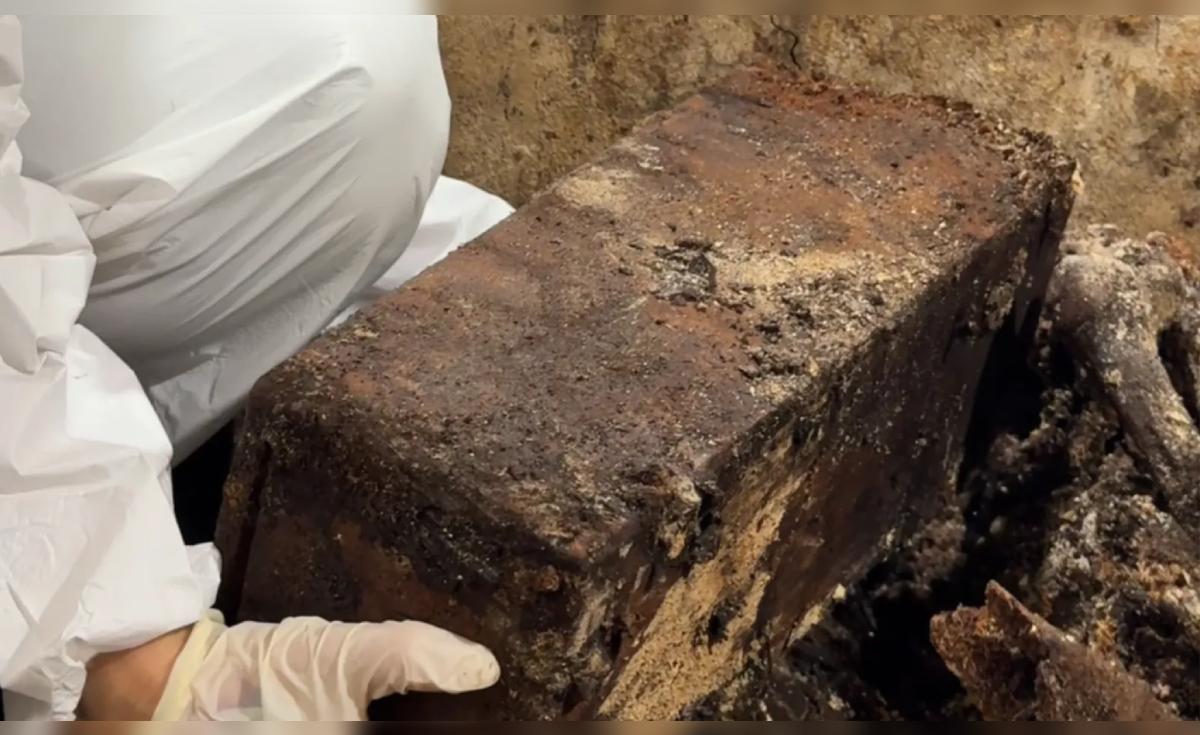 Arqueólogos descubren ataúd bien conservado con restos de bebé en cementerio italiano
