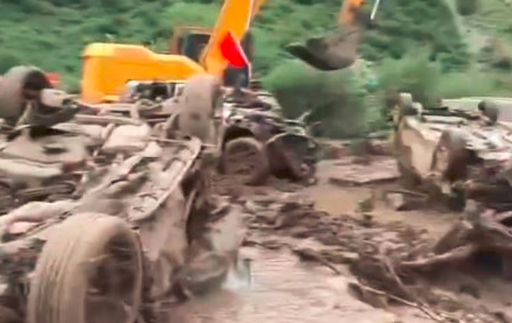 Heavy rains trigger mountain flood in Gansu, killing at least 10 and injuring 23