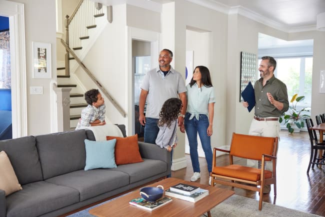 Couple reviewing offers on their home