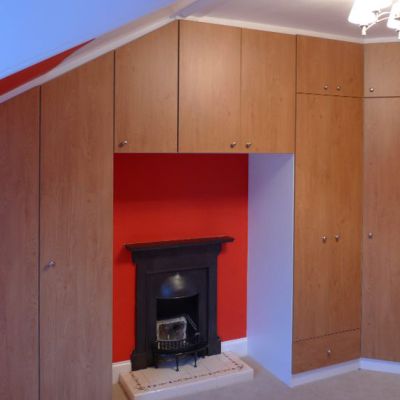 Angled cabinetry with Oak MFC finish