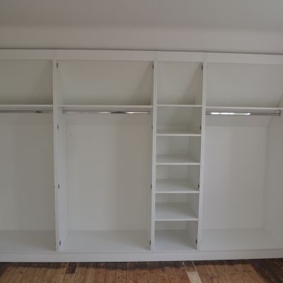 Angled cabinetry in eaves