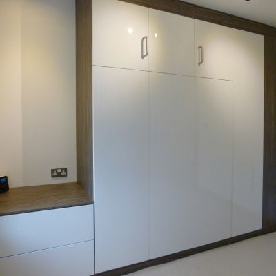 side board with drawers and foldaway bed in wardrobe