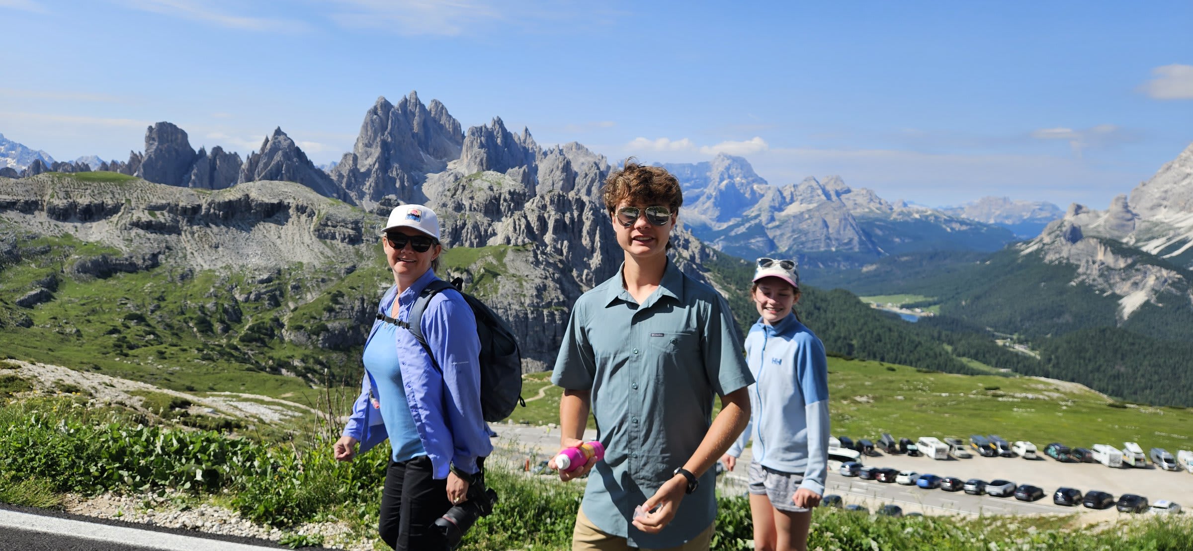 The winding road leading up to Tre Cime di Lavaredo with dramatic Dolomite peaks in the background