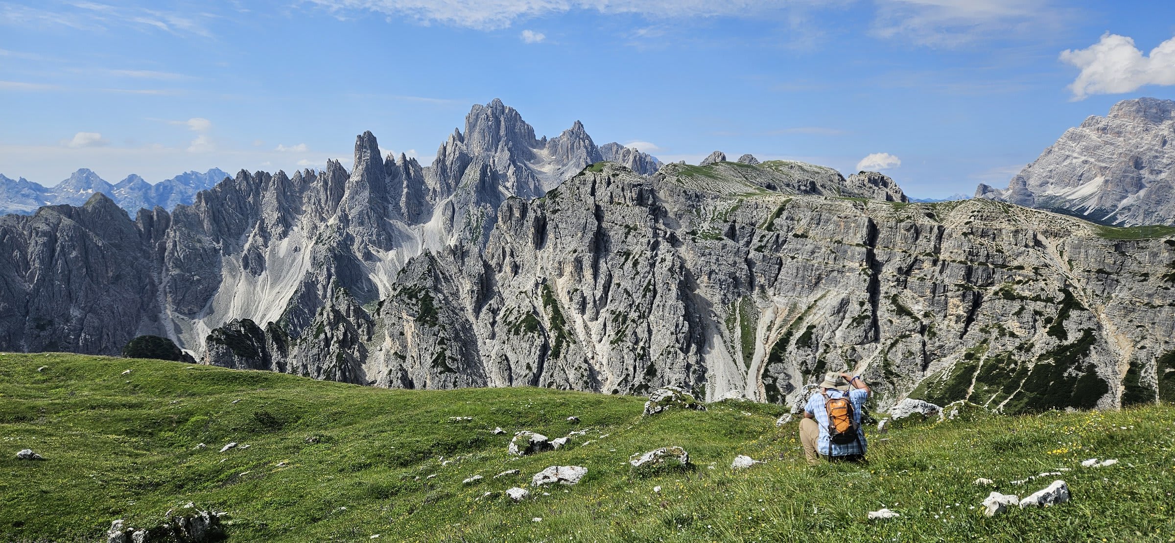 The winding road leading up to Tre Cime di Lavaredo with dramatic Dolomite peaks in the background0