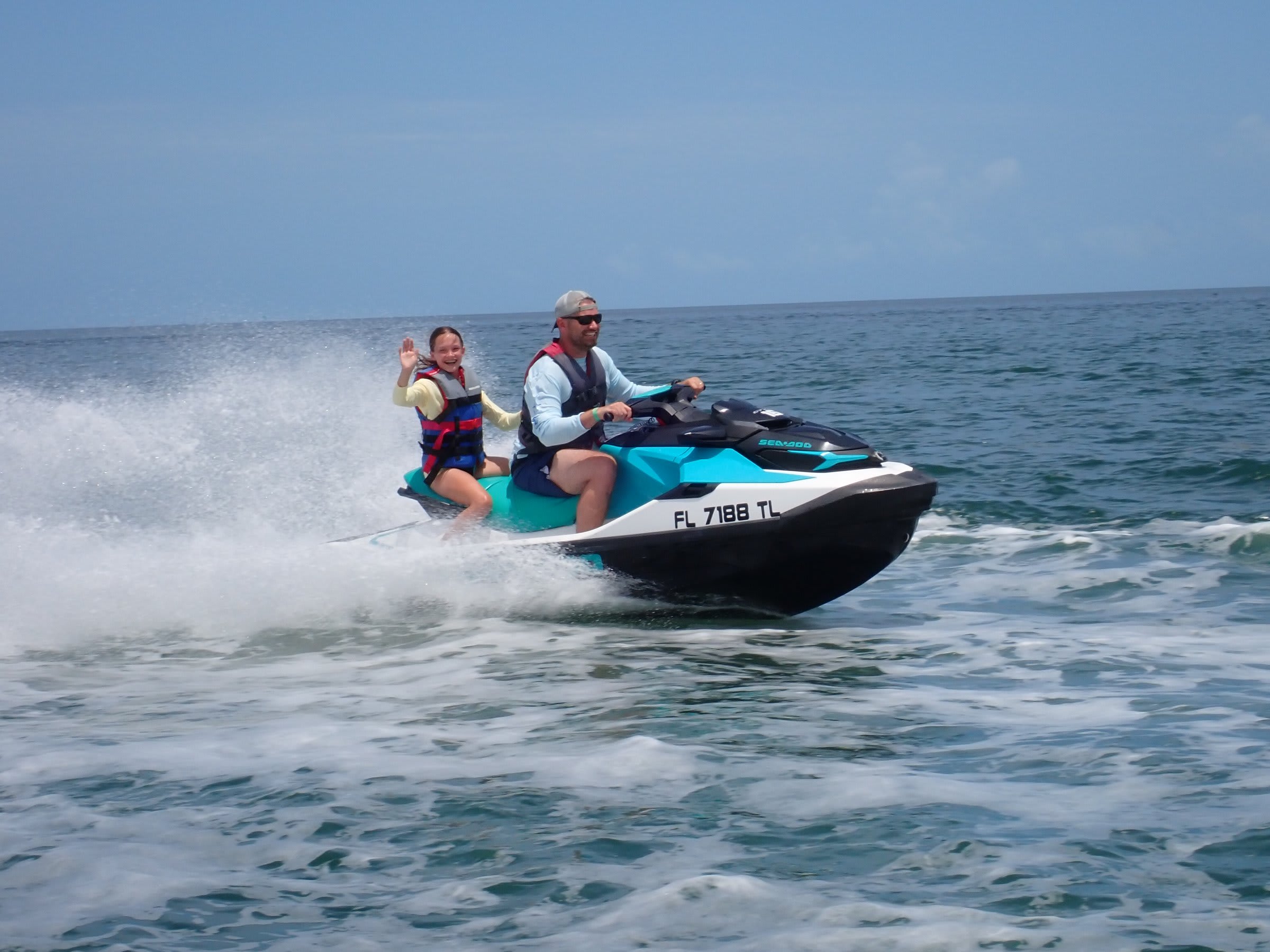 Riding jet skis on open water in Key West