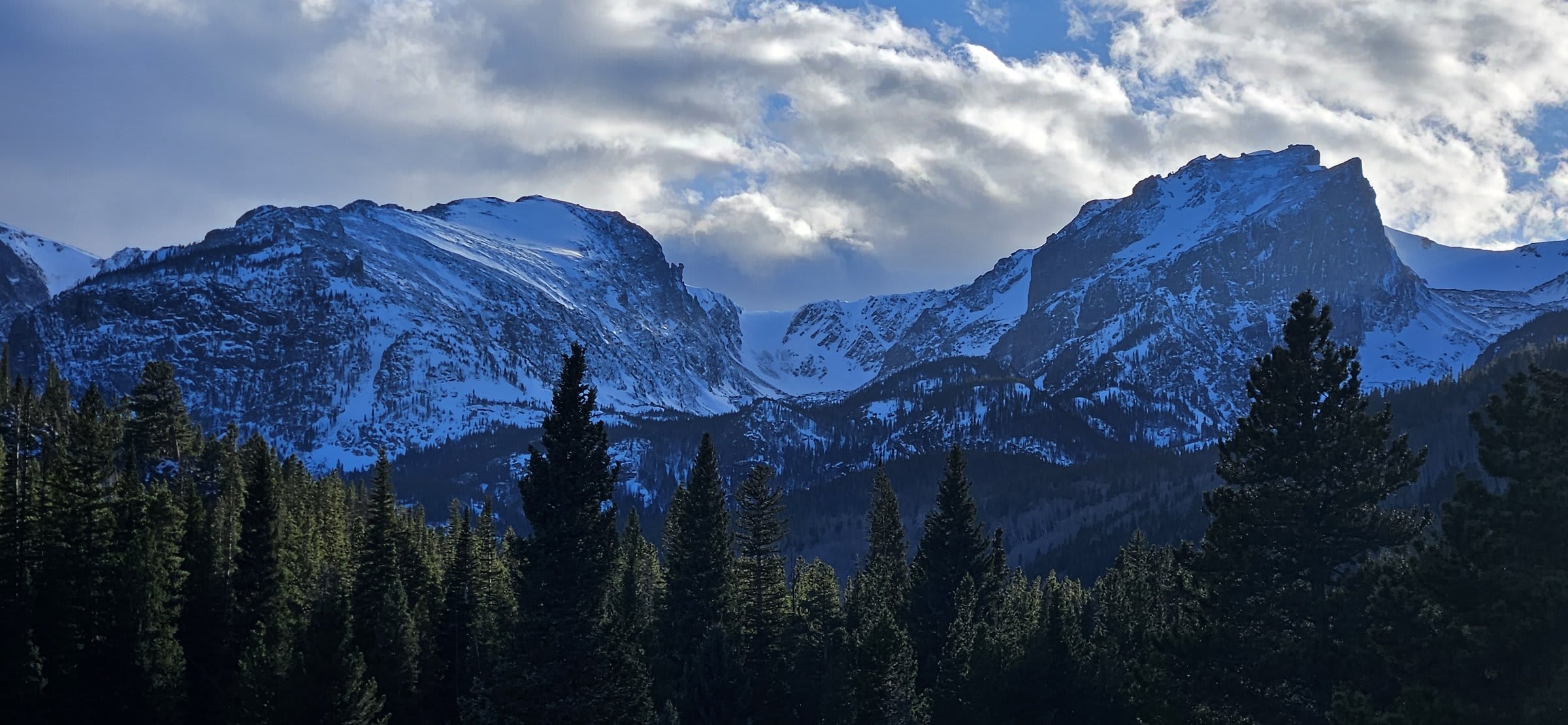 Warm sunset tones on snowy meadows near Glacier Creek