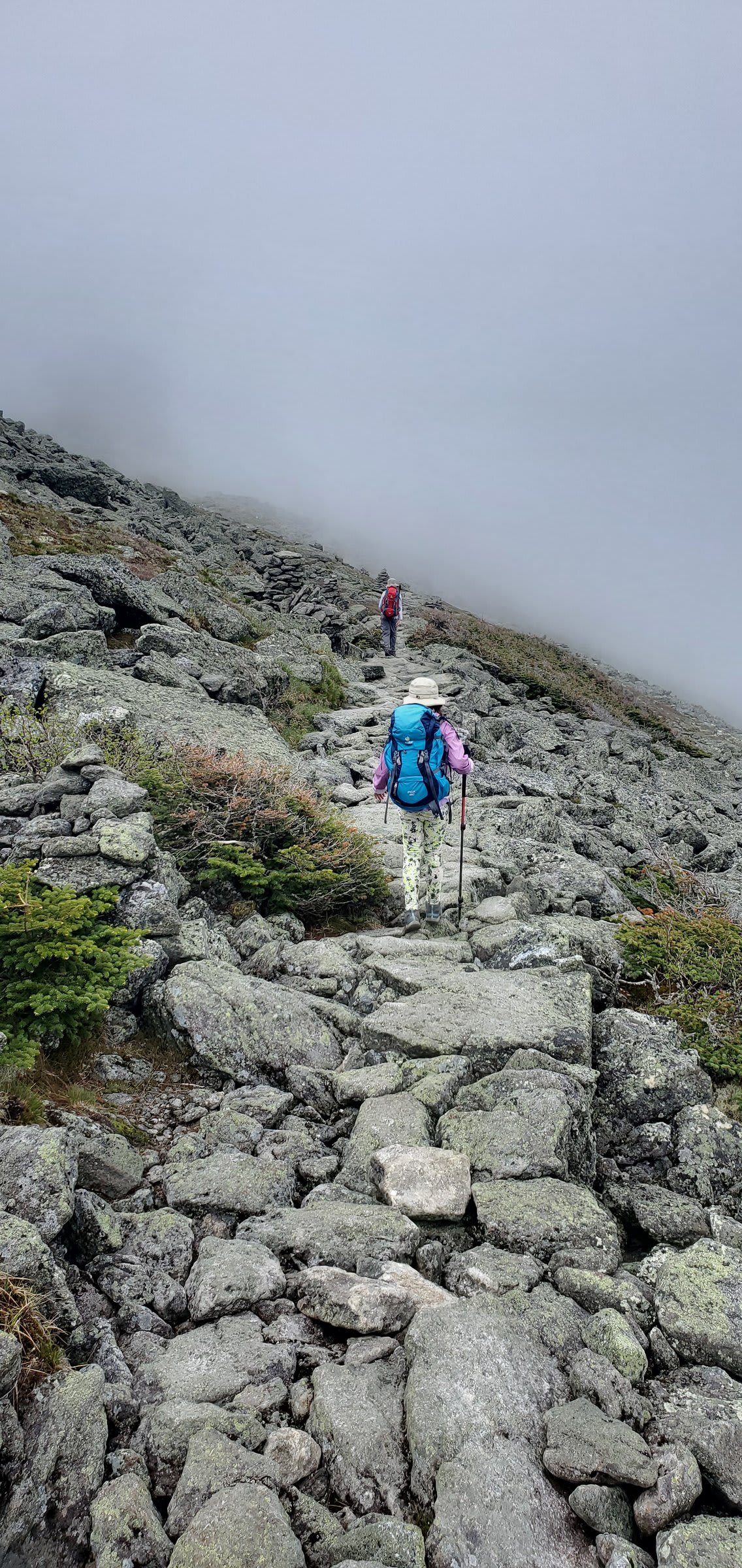 Climbing the stone steps up into the clouds