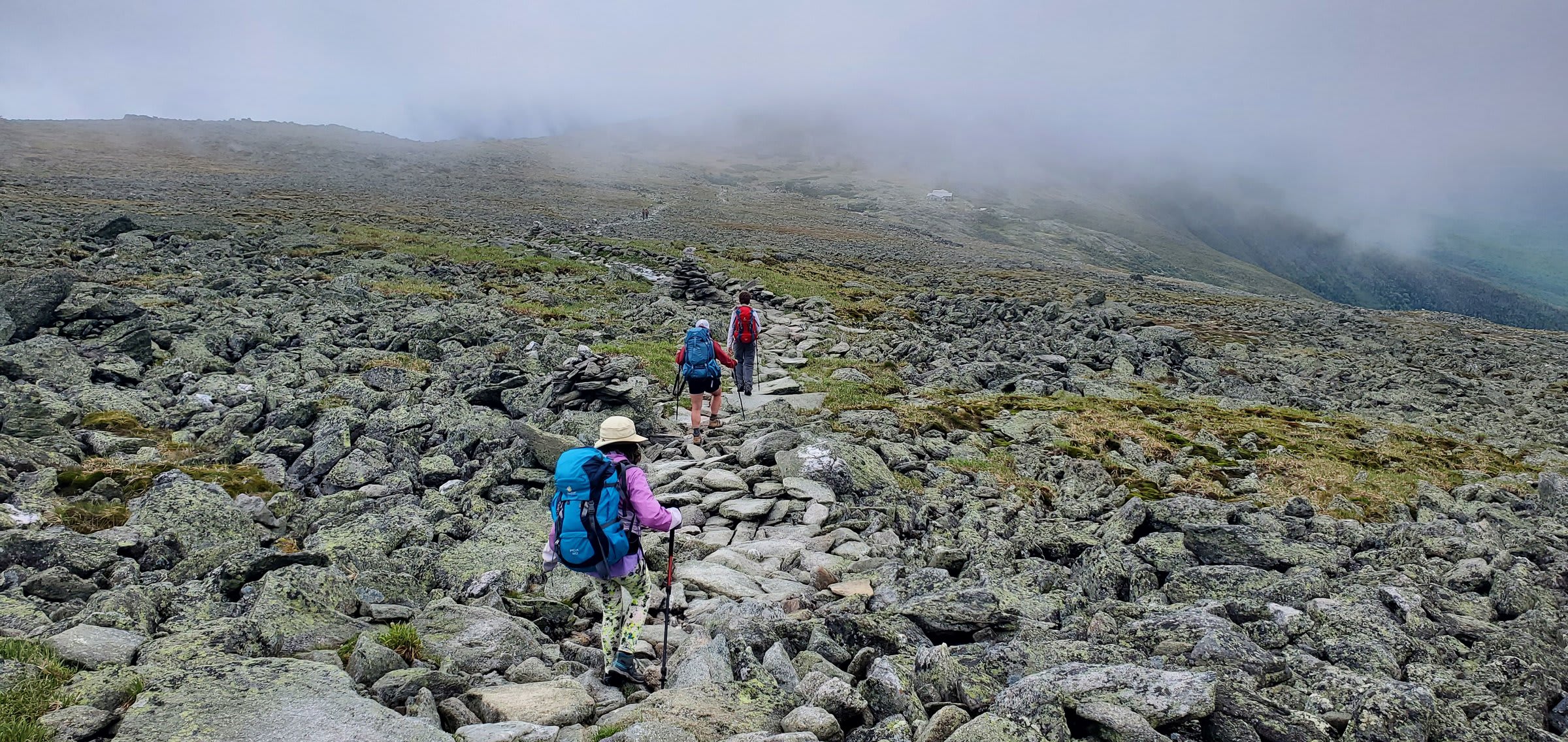 Crossing the boulder field as fog rolls through