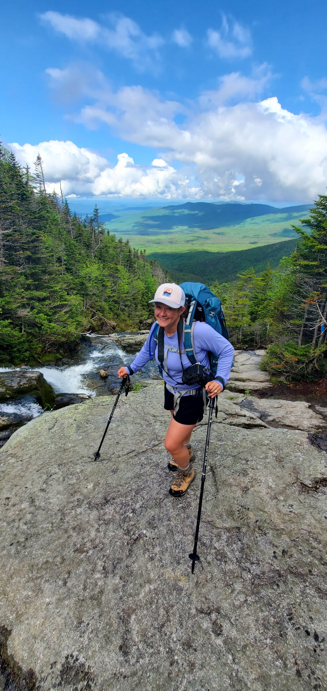 Hikers carefully navigating slippery terrain