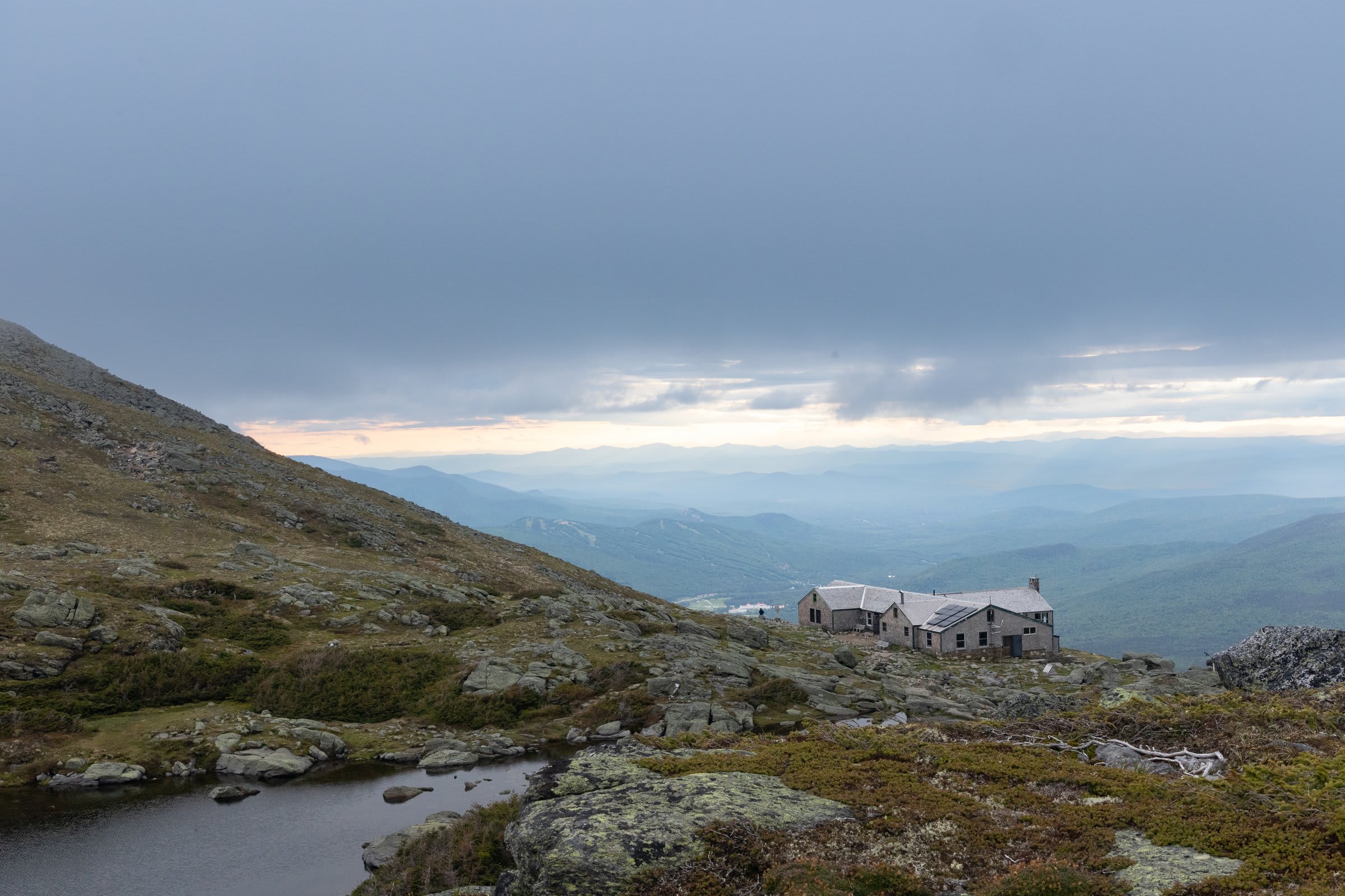 Alpine tundra landscape surrounding the hut