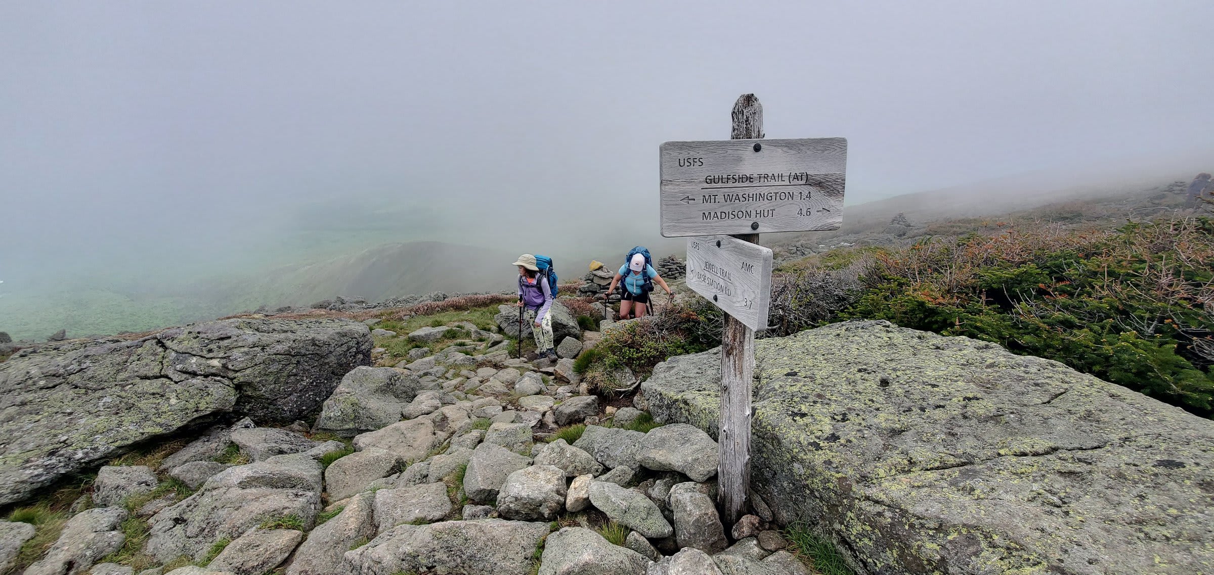 Gulfside Trail junction sign emerging from the fog