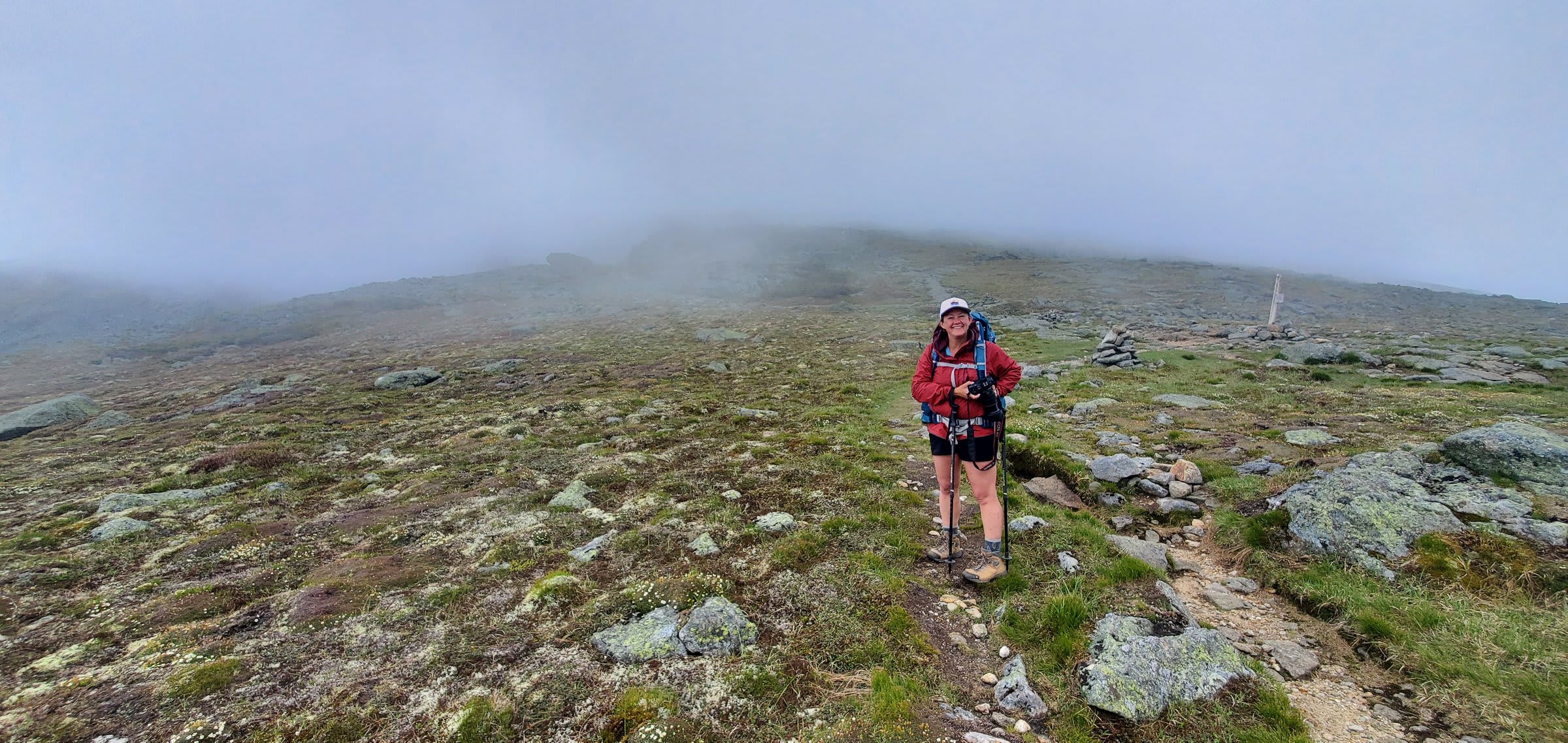 A backpacker on the misty alpine tundra
