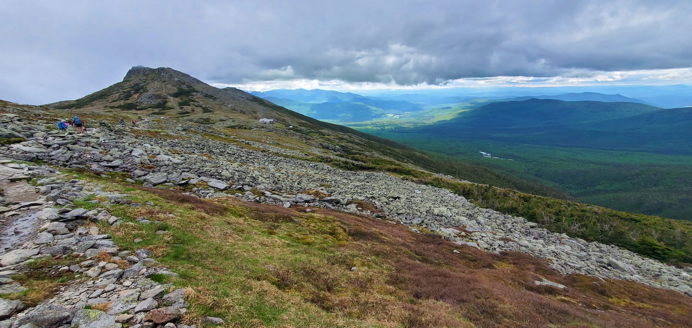 The hut and Mount Monroe come into view along the ridge