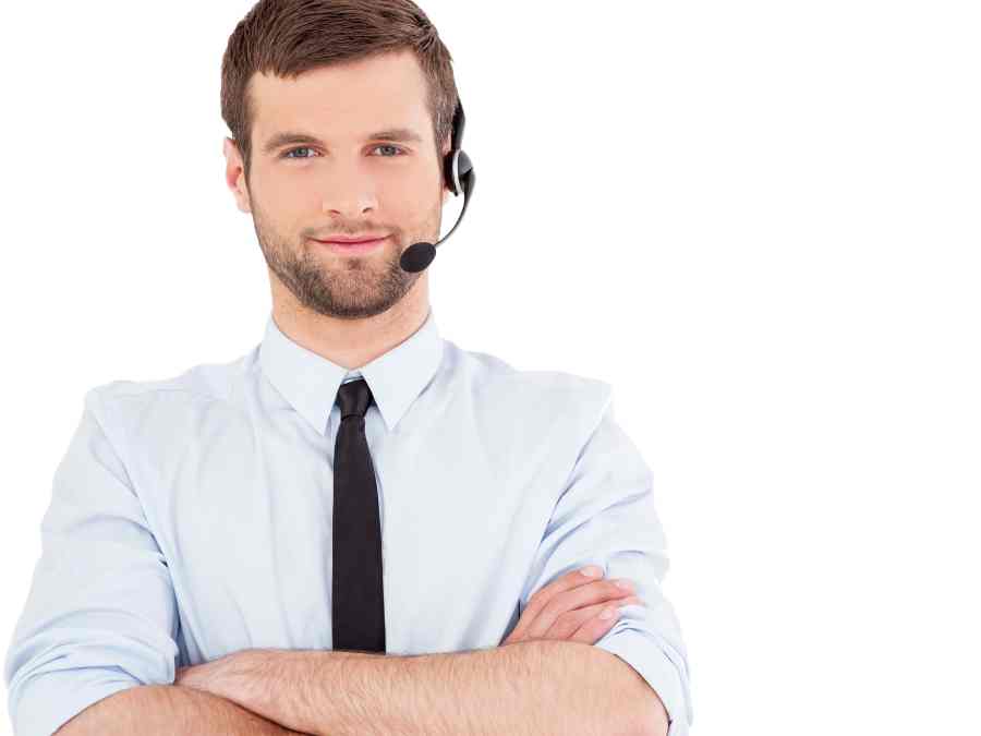 Young contact center employee with his arms crossed