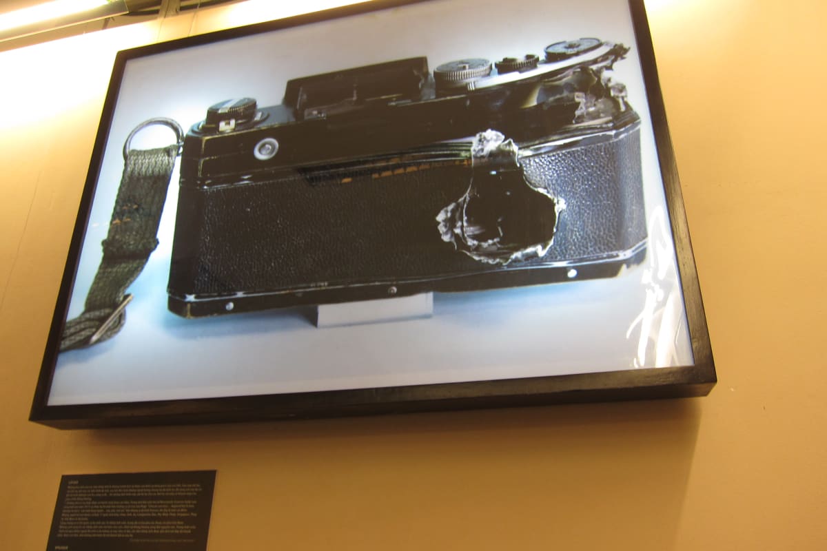 Image of the camera with a bullet hole in it, belonged to Taicho Ichinose, a war photographer in Cambodia and Vietnam.