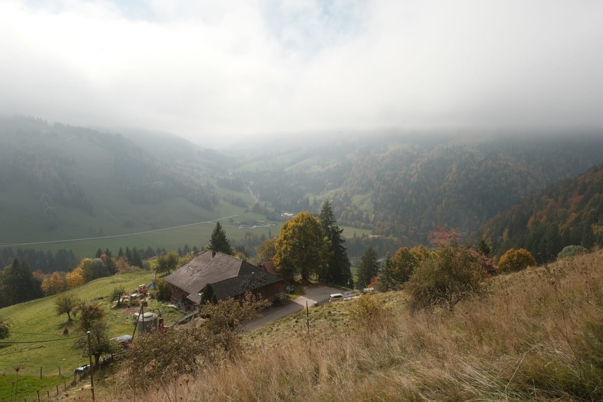 We emerge from under the clouds to a view of the valley below.