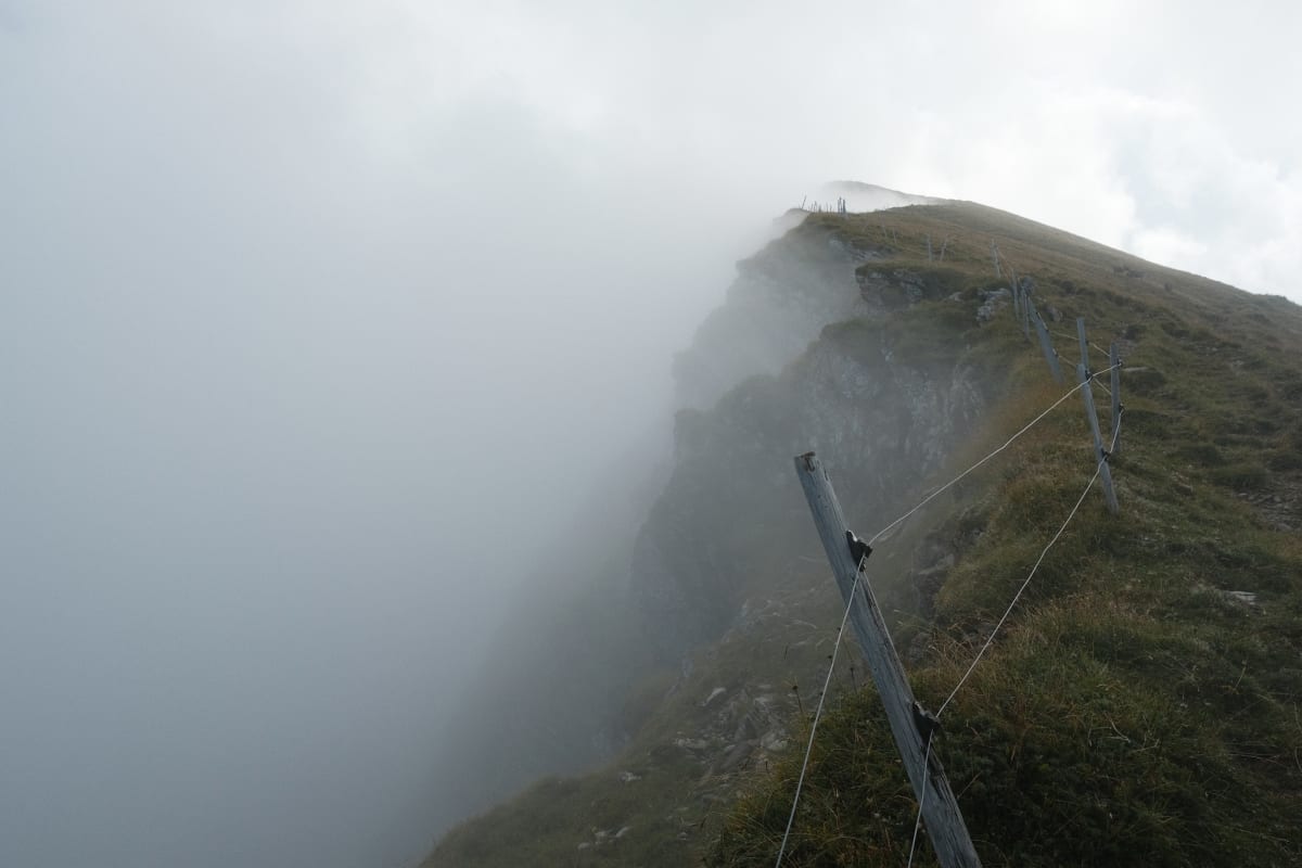 Clouds and fog along the Niesen cliffs.