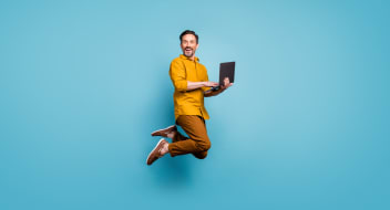 a jumping man with a computer on a blue background