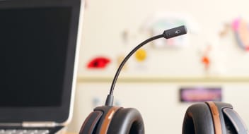 Desk with computer and cellphones