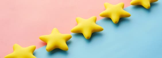 Five stars on pink-blue background