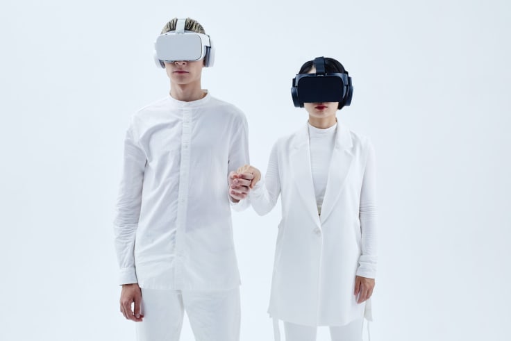 man-and-woman-standing-with-vr-glassess