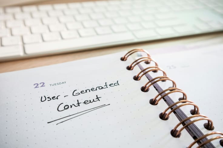 A handwritten note that reads &quot;user-generated content.&quot; That type of content will be highly useful on social media platforms. 