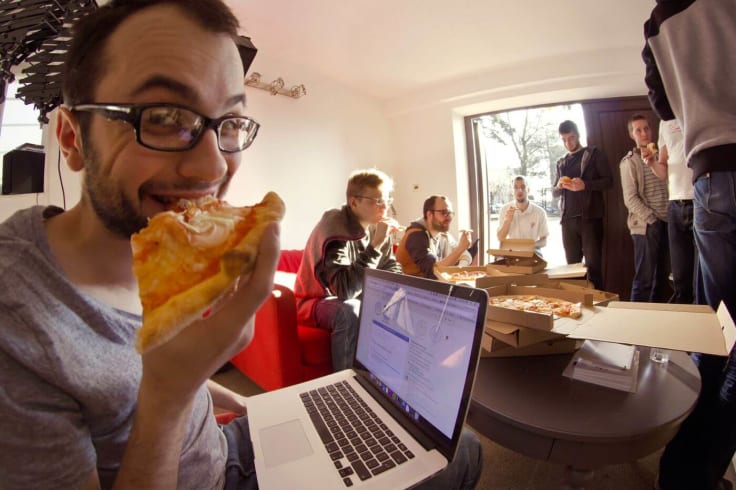 eating pizza pizza day customer support