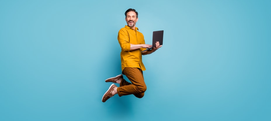 a jumping man with a computer on a blue background