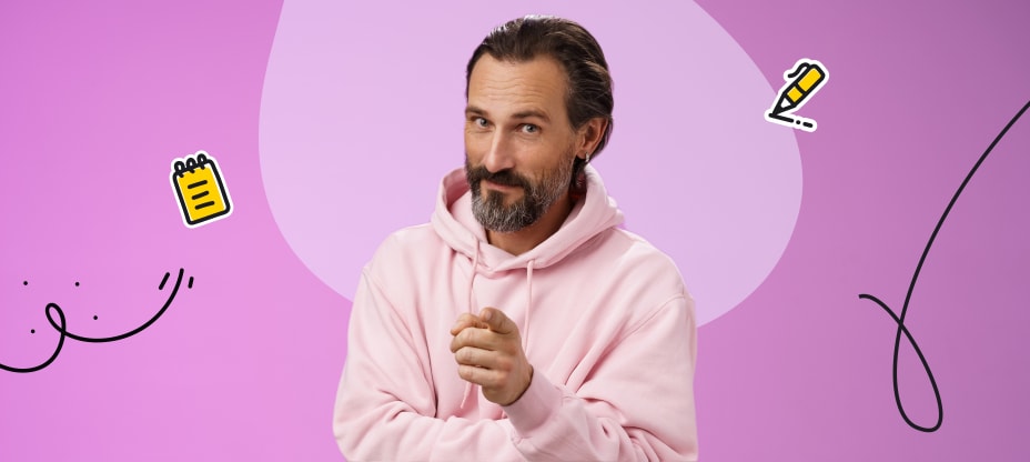 the man in a pink sweatshirt pointing at you