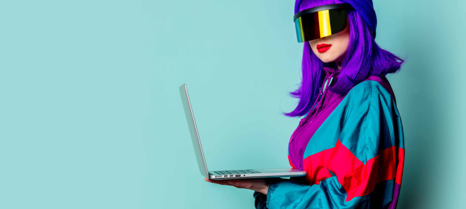 Woman with Purple Hair Holding Laptop