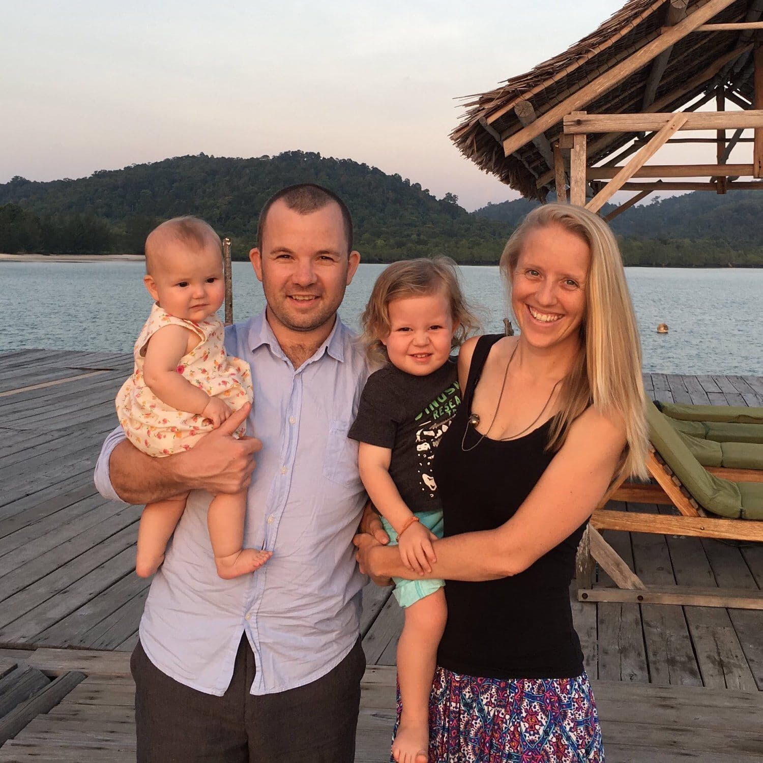 The family on a dock at sunset