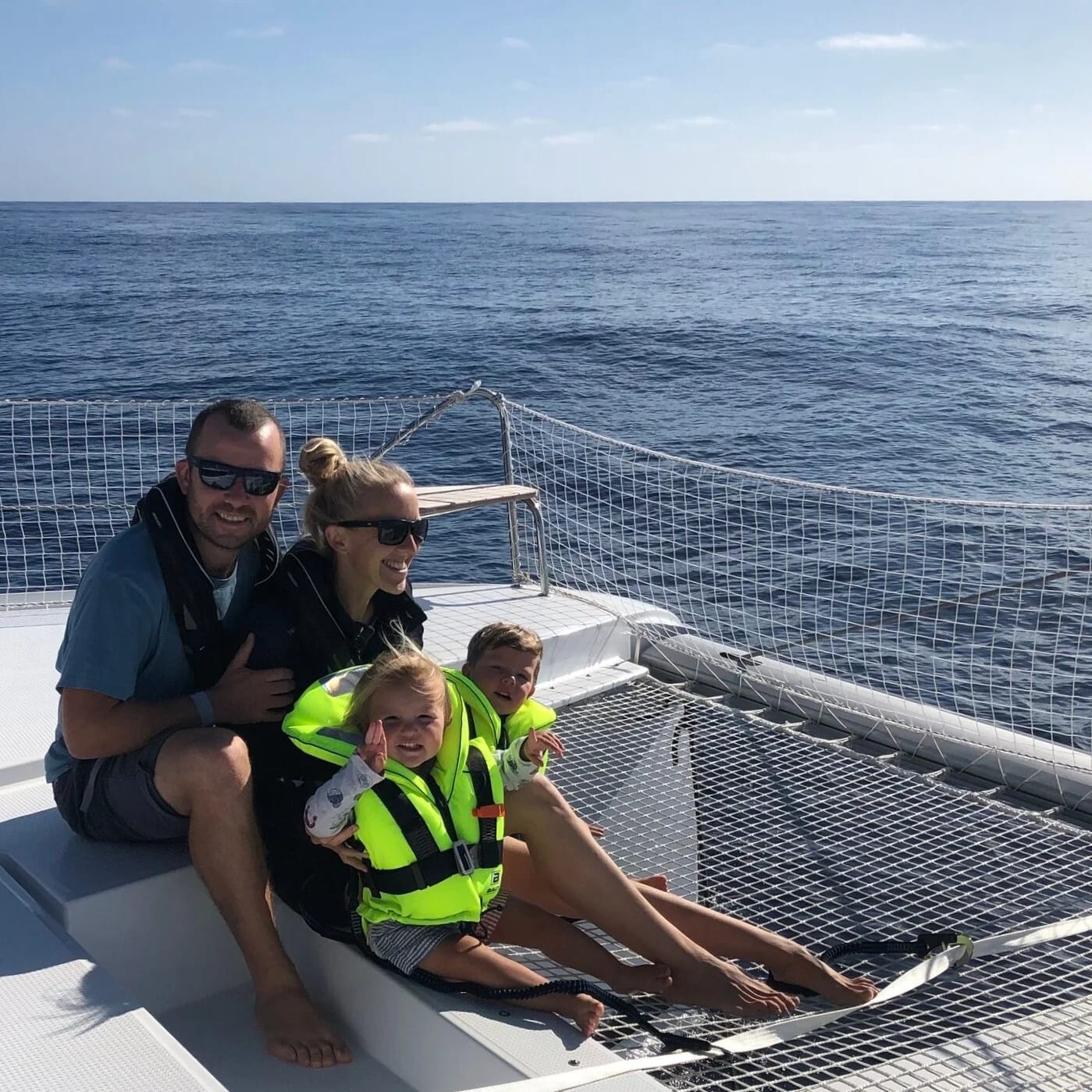 The family sailing on the catamaran