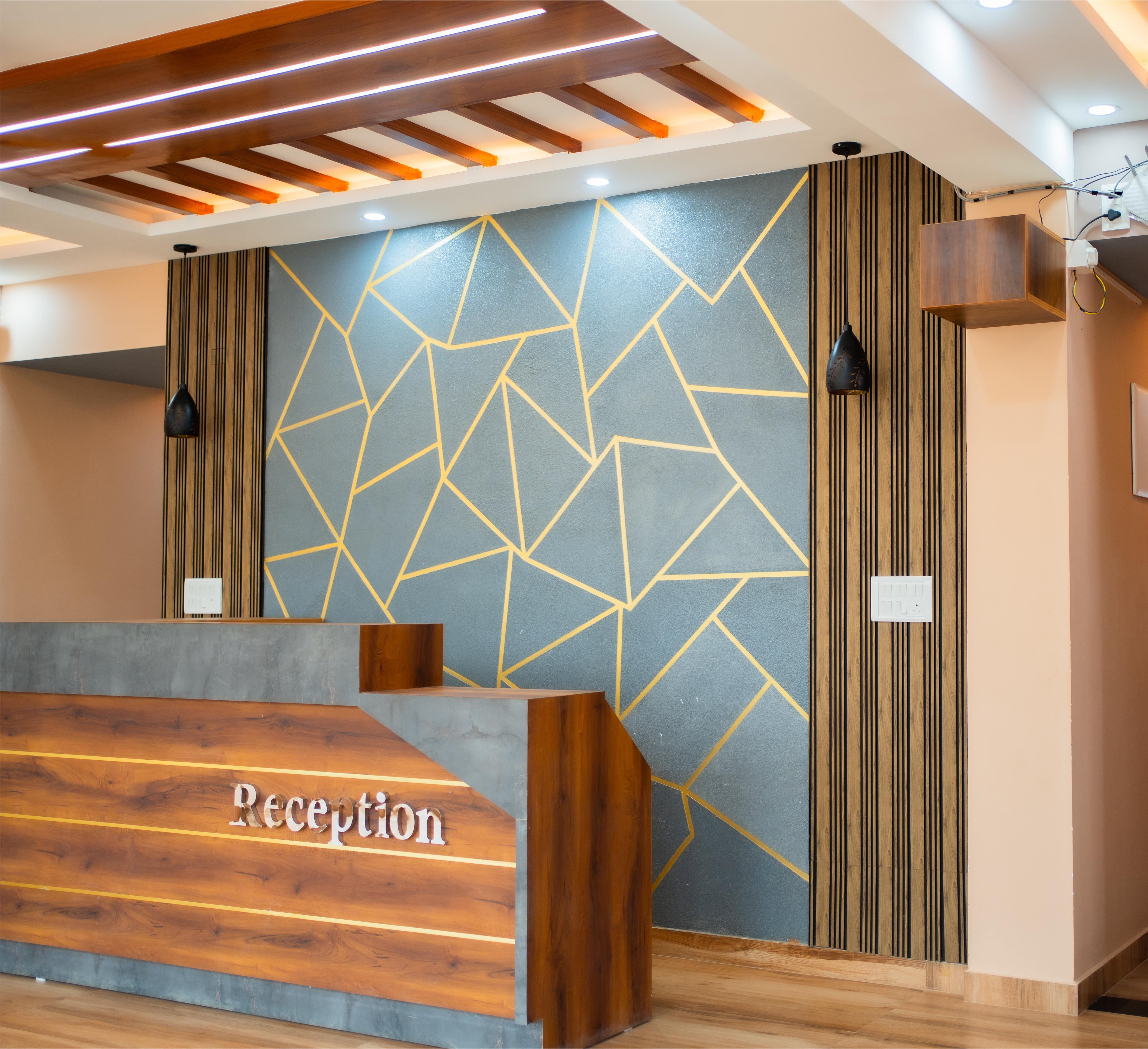 Elixir Hotel bar seating area with illuminated bar counter