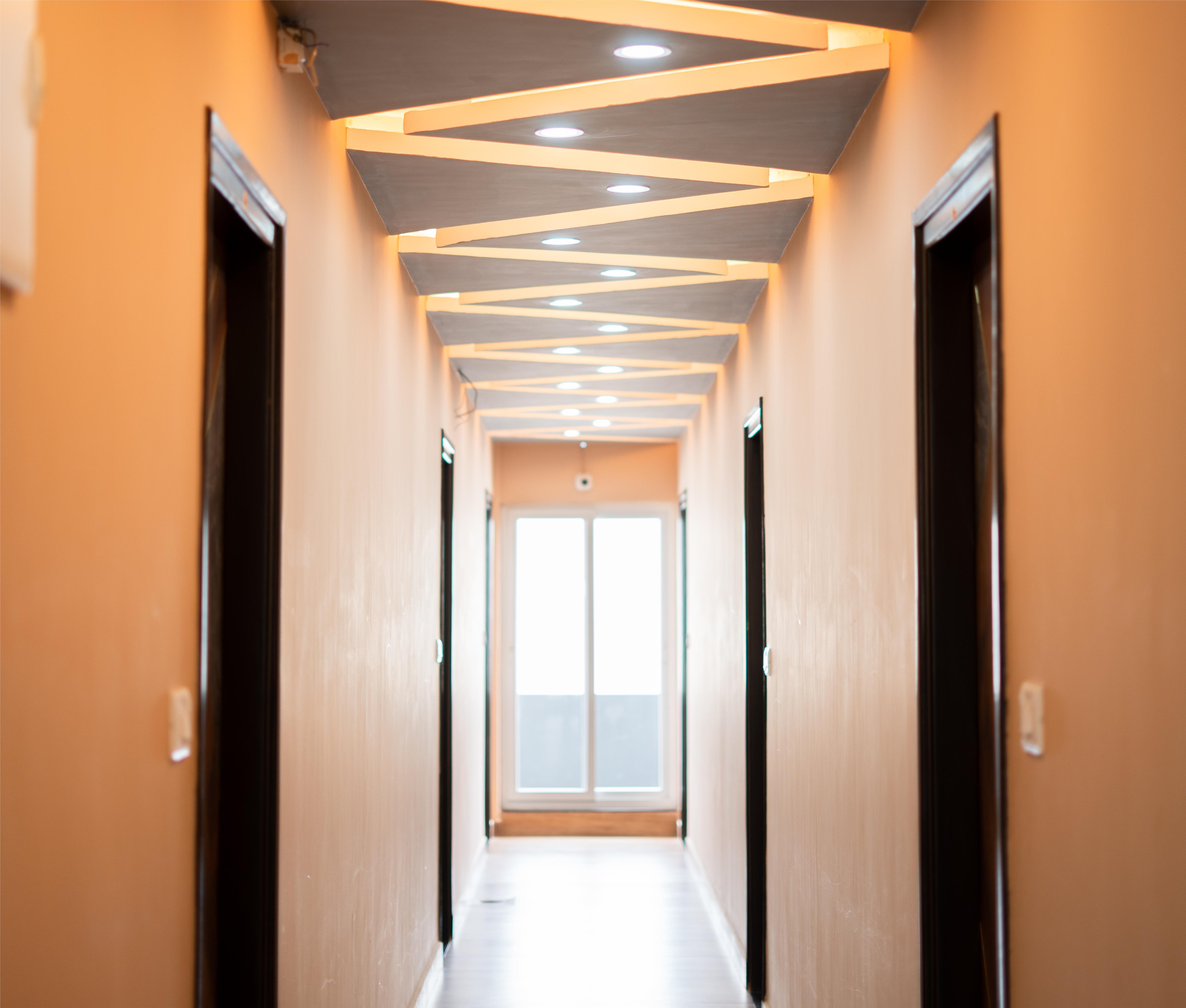 Elixir Hotel reception area with modern decor and lighting