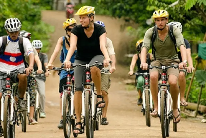Vang Vieng Bicycle Tour Visiting the Local Villages, Cave, and Blue lagoon image