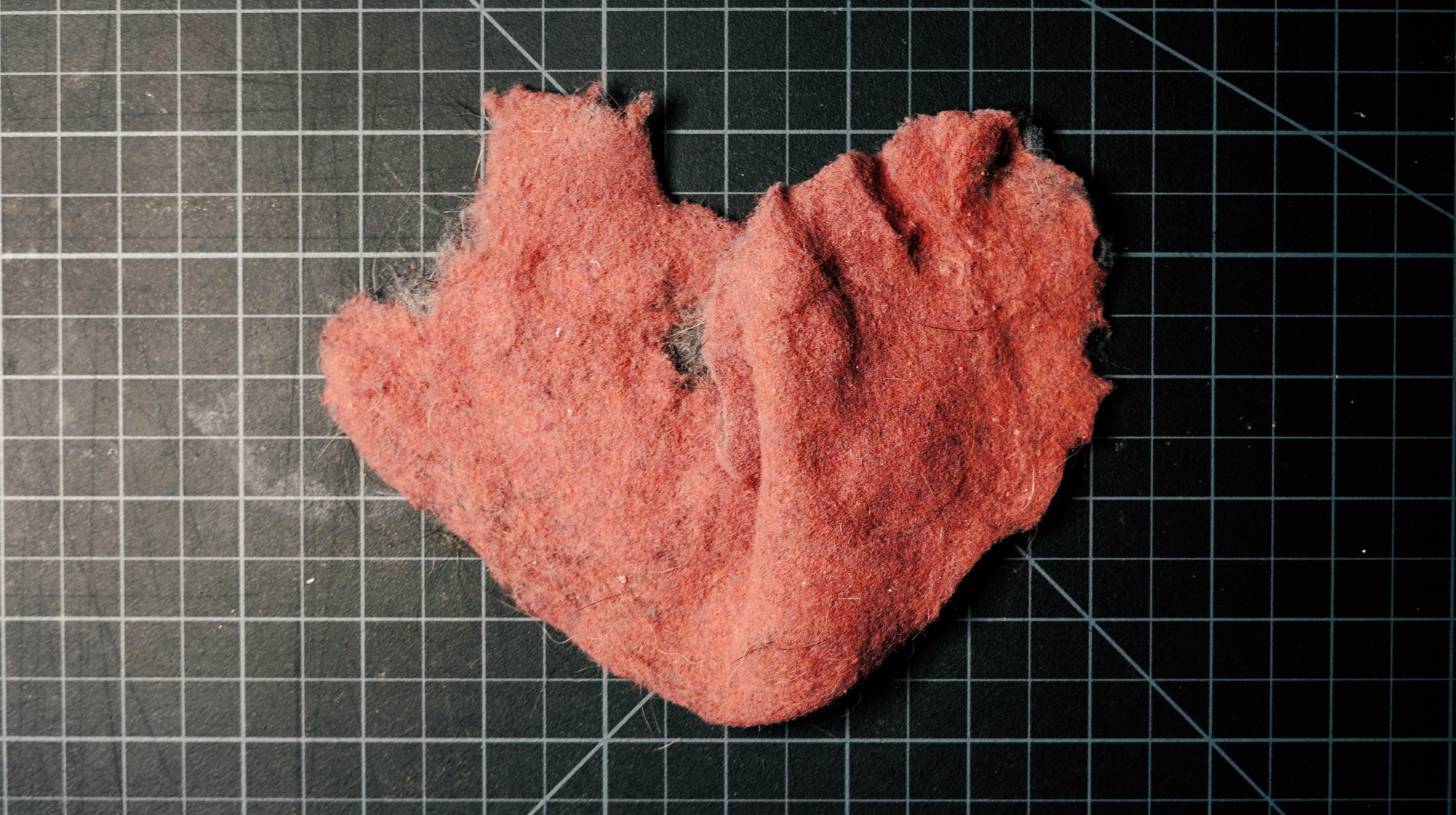 a heart shaped wad of lint