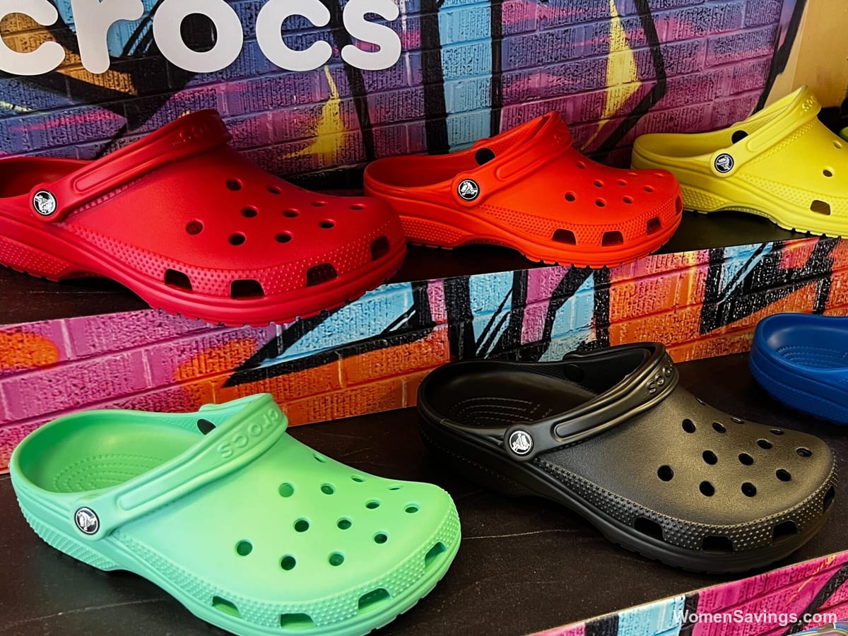 Pair of colorful Crocs clogs displayed for the extra 50% off sale