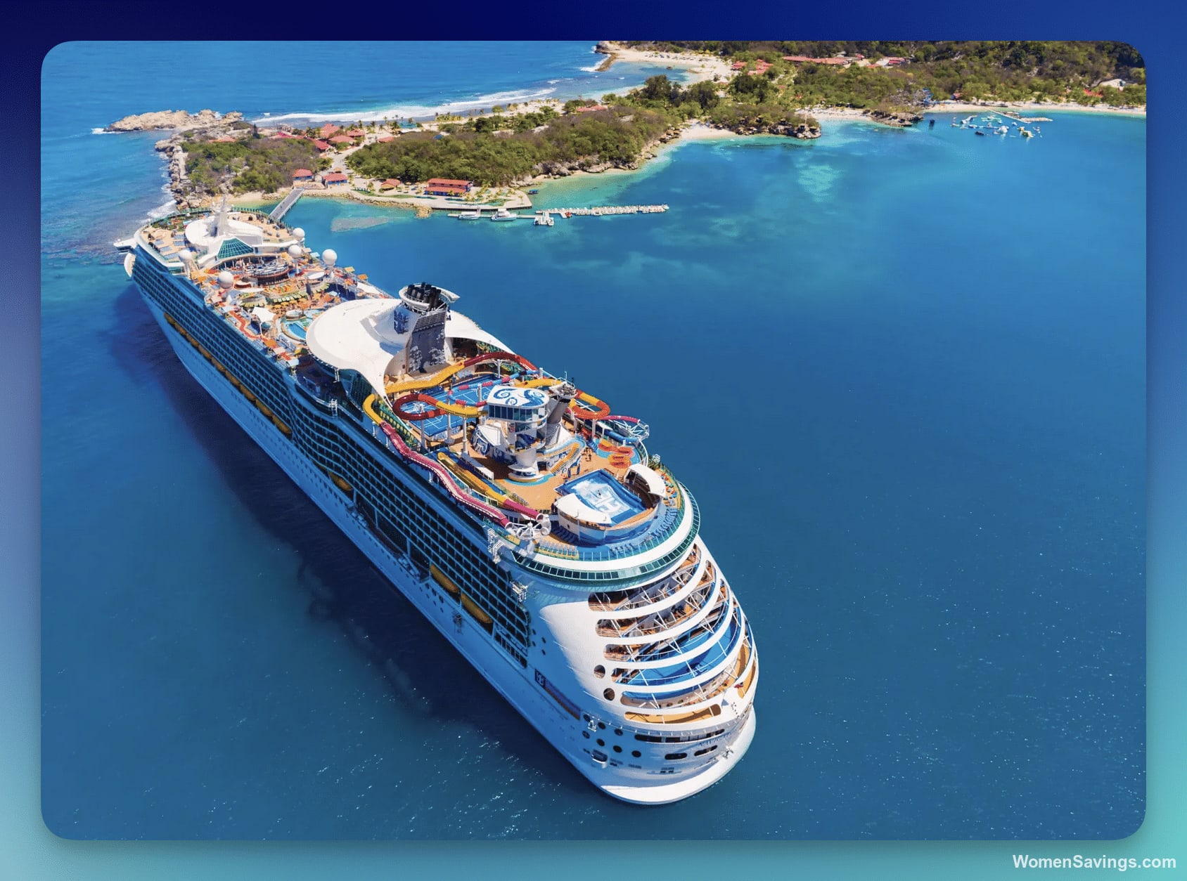 Cruise ship sailing through turquoise Caribbean waters at sunset
